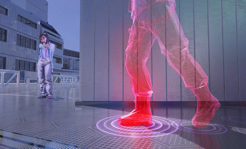 一個人拿著塑膠槍瞄準電腦遊戲世界中的 3D 人物，人物的腳邊被代表聲音的光環圍繞